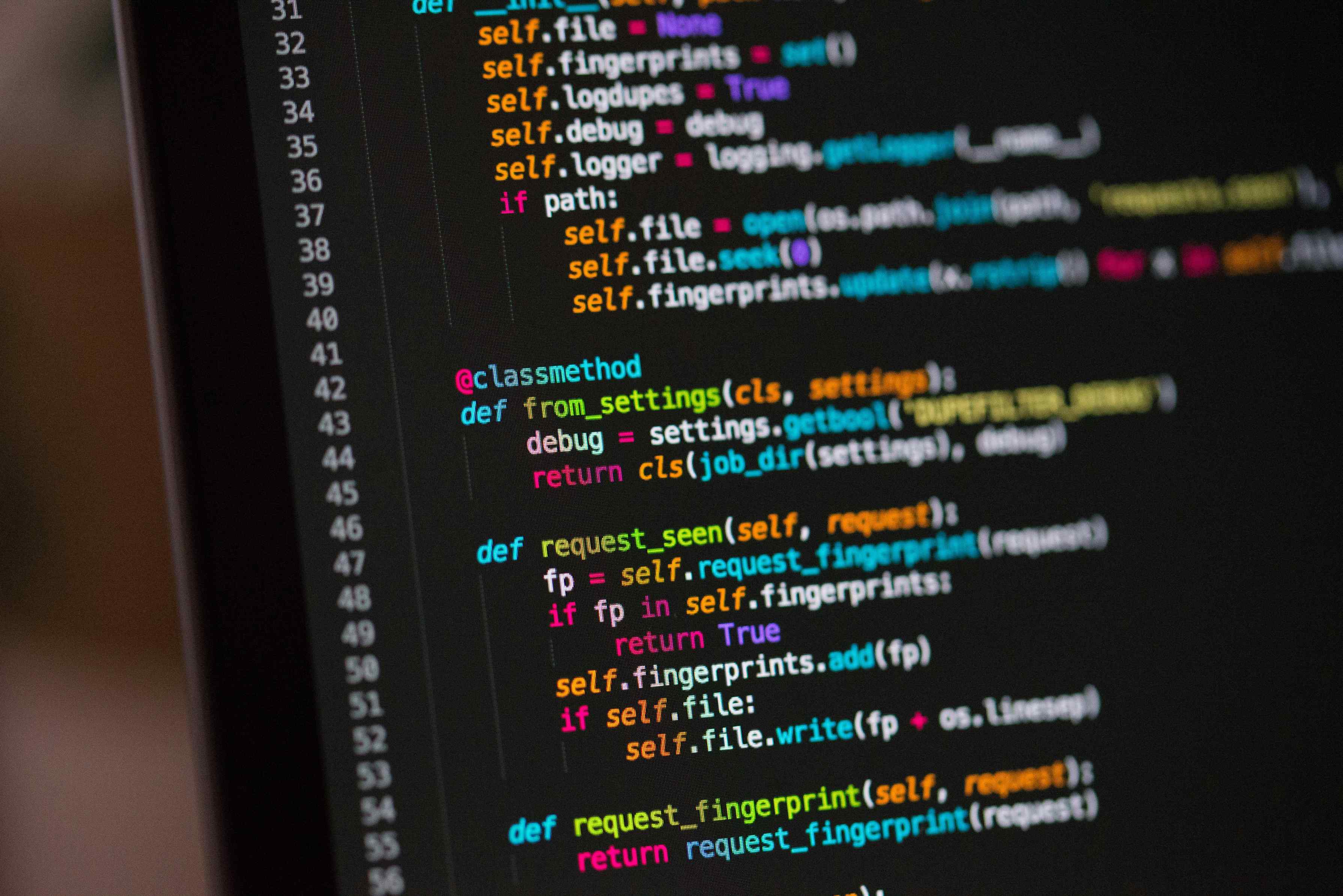 Close-up of code on a computer screen with syntax highlighting, illustrating code review and programming practices