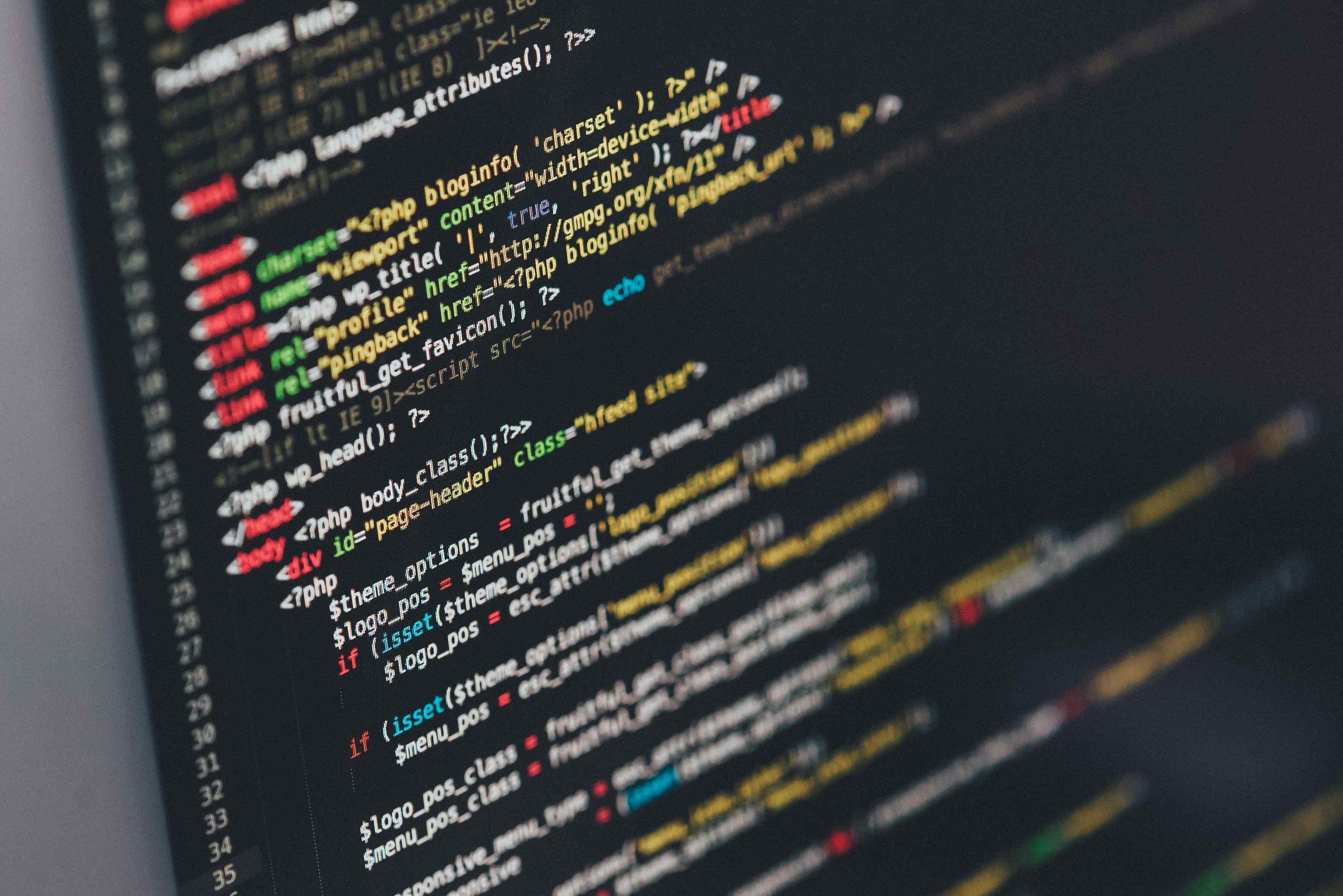 Code editor showing programming source code - Photo by Ilya Pavlov on Unsplash